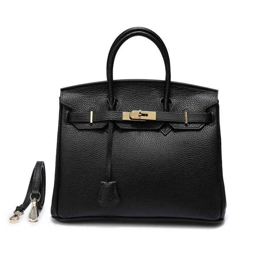 Ny huvudläderväska läder kvinnors handväska litchi mönster kvinnors en axel messenger väska