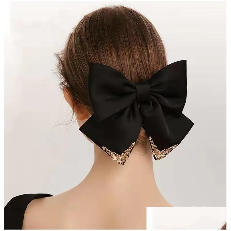 Pinces à cheveux Barrettes Barrettes Style High Luxury Bow Hairpin Design Sens de l'élégance Top Head Hair Spring Clip Accessoire Dhgarden Dhbkt