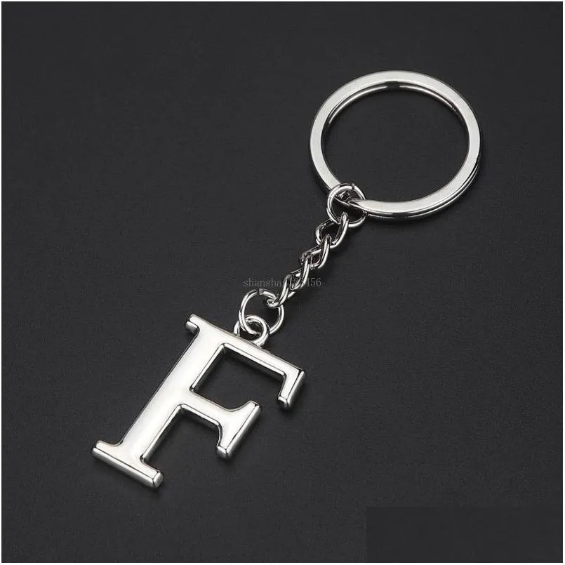 Nyckelringar 26 Engelska Inledande nyckelring Metal Alfabetet Letter Keychain Handv￤ska h￤nger Fashion Jewelry Drop Delivery Dhjlq