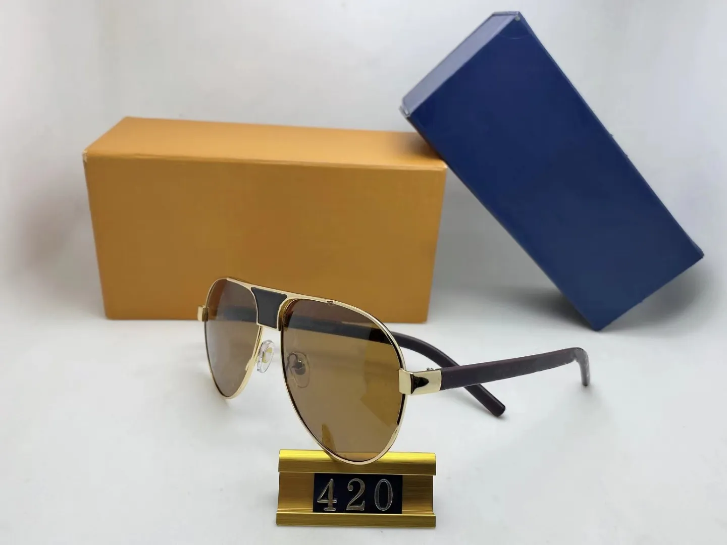 Lüks güneş gözlükleri 420full çerçeve vintage tasarımcı kanıtlar erkekler için güneş gözlüğü parlak altın logo sıcak satma kaplama üst