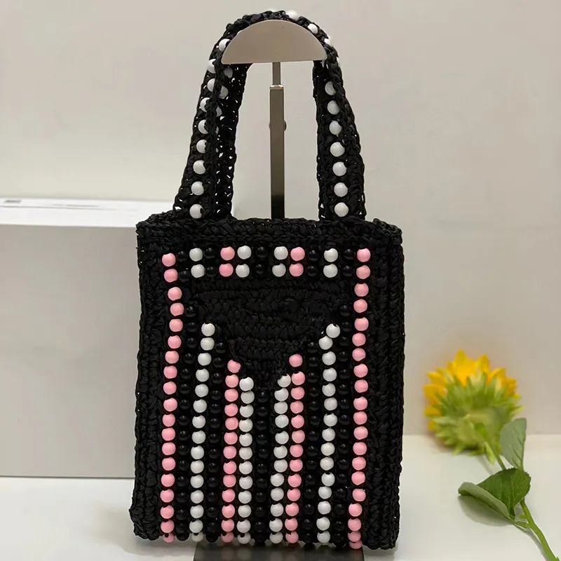 7A Quality Design Women Tote Borse da spiaggia in paglia Borsa a tracolla in rafia fatta a mano albicocca Borse da viaggio estive Stampa di lettere nere Borse moda a triangolo Scava fuori