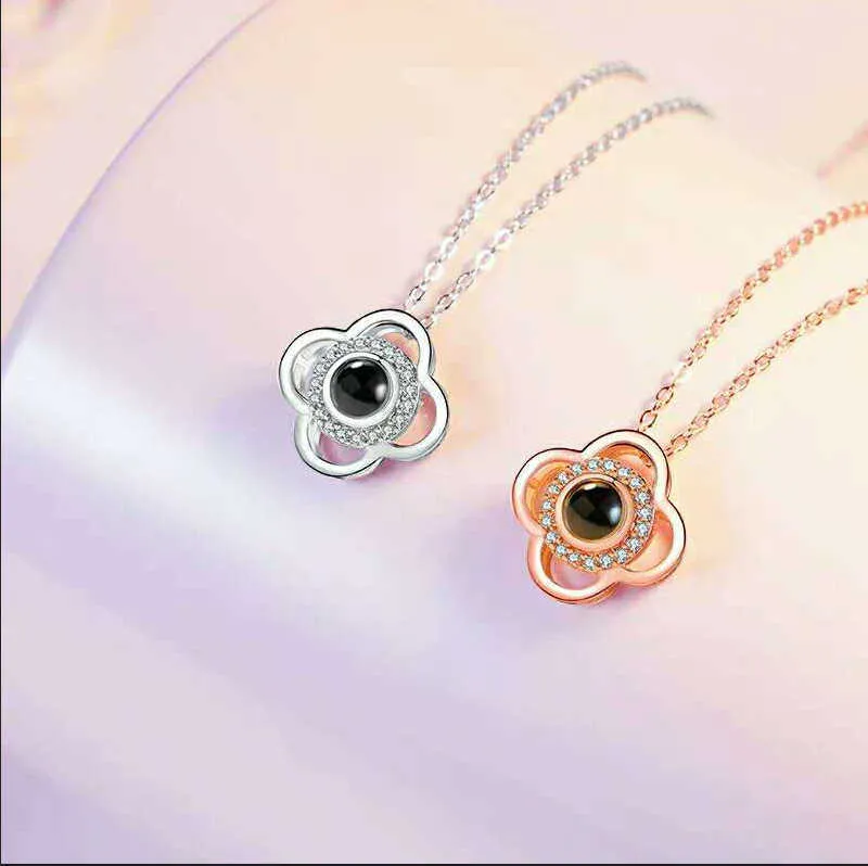 Necklaces 100 Languages I Love You Four leaf Grass Projection Necklace Women's Pendant Rose Gold Lock Bone Fade resistant Gift