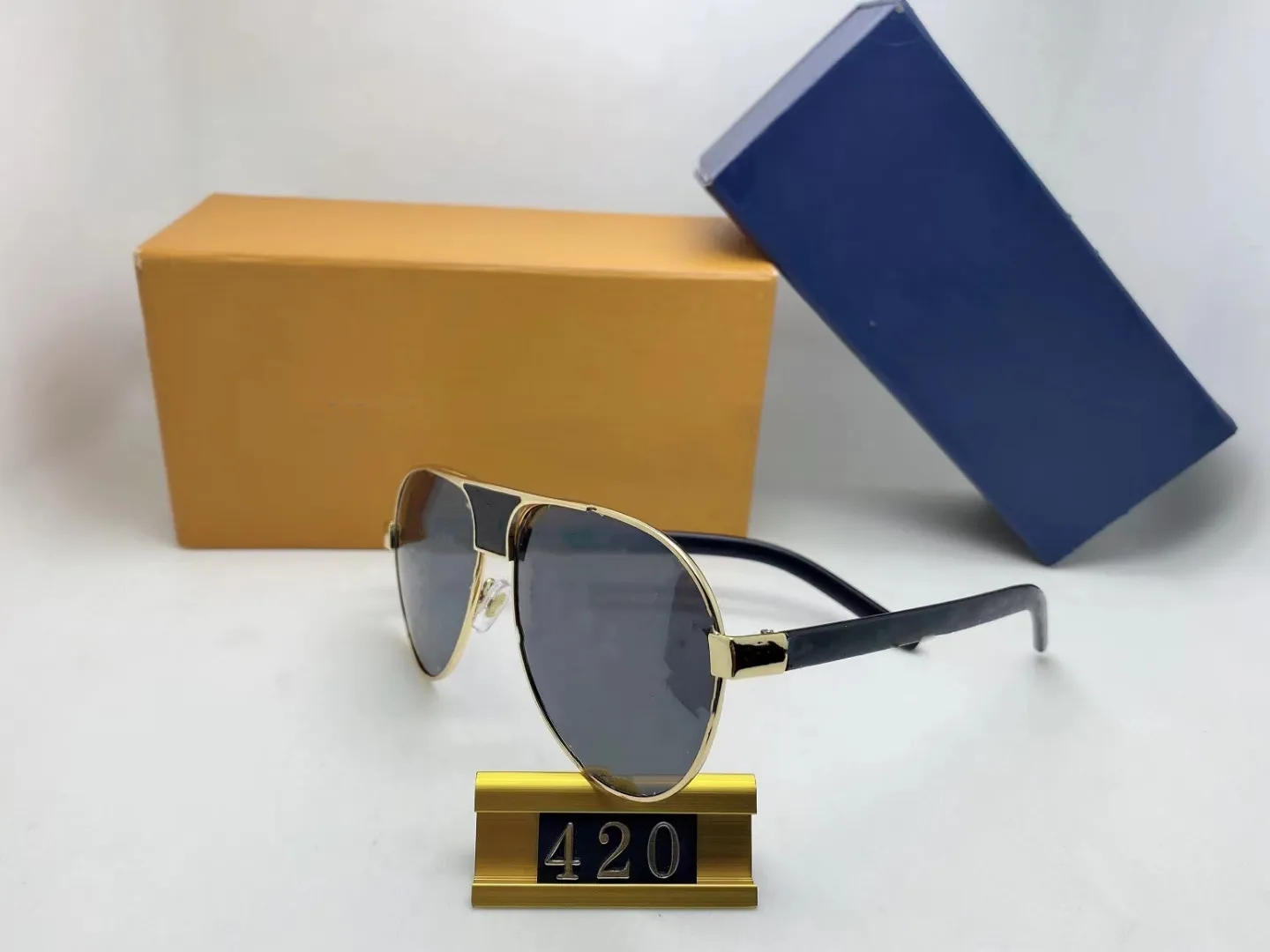 Occhiali da sole di lusso 420 Full Frame Designer vintage Evidenc Occhiali da sole uomini Logo Shiny Gold Sell Sell Top placcato