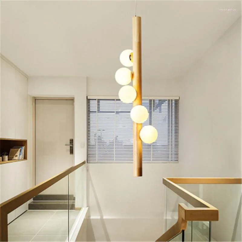 Lampade a sospensione Nordic Magic Bean Light Tromba delle scale Creative Art Déco Ristorante semplice Molecular Modern Wood Personality Chandelier