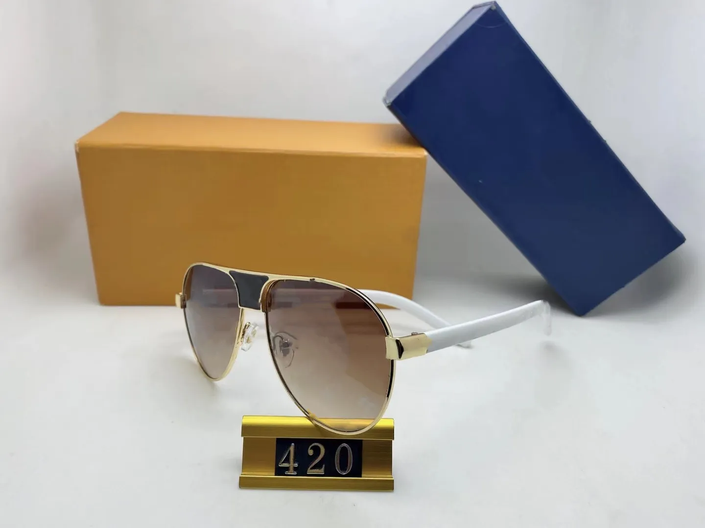 Occhiali da sole di lusso 420 Full Frame Designer vintage Evidenc Occhiali da sole uomini Logo Shiny Gold Sell Sell Top placcato