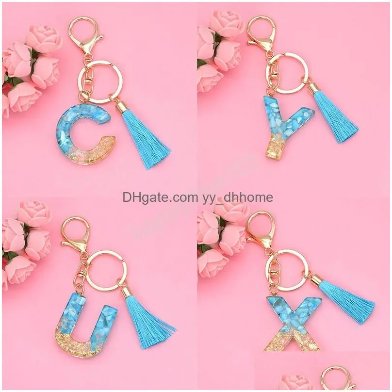 Nyckelringar Fashion AZ Letters Inledande nyckelkedja med Tassel Blue Stone Filling Plastic Keychain Söt handväska som hänger hänge