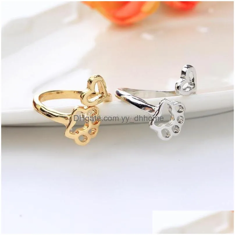 Adjustable Hollow Dog Paw Footprint Ring Tightener Band For Women And