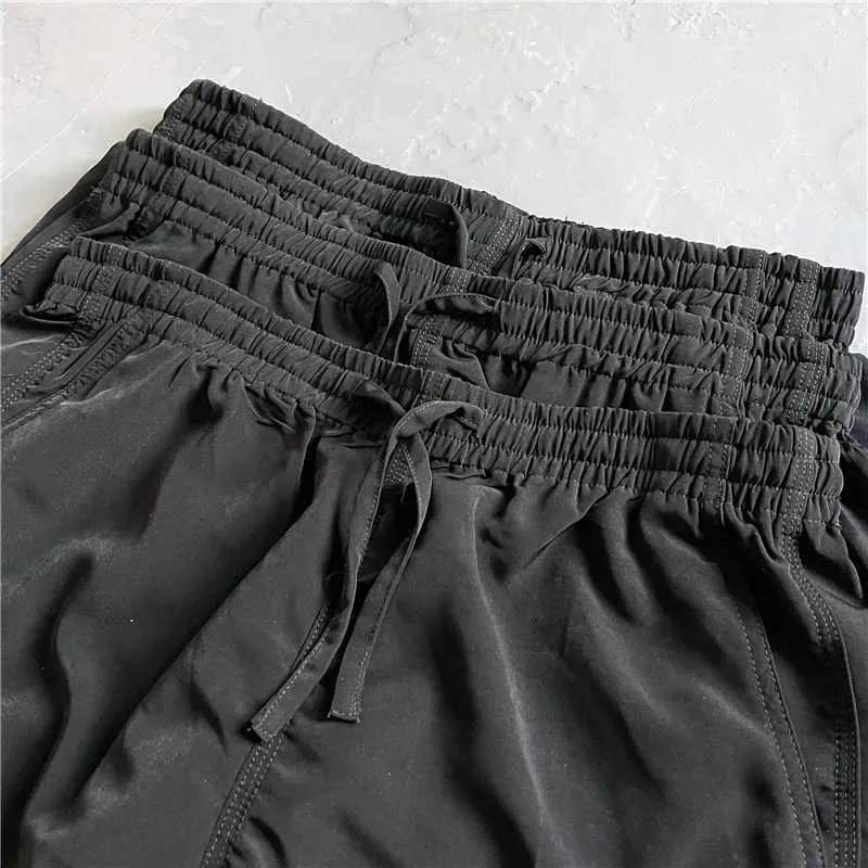Pantalones cortos para hombres nuevos pantalones cortos para hombres Mujeres de alta calidad nylon mariposa bordado agujas pantalones cortos pantalones ventilación impermeable T221129 T221129