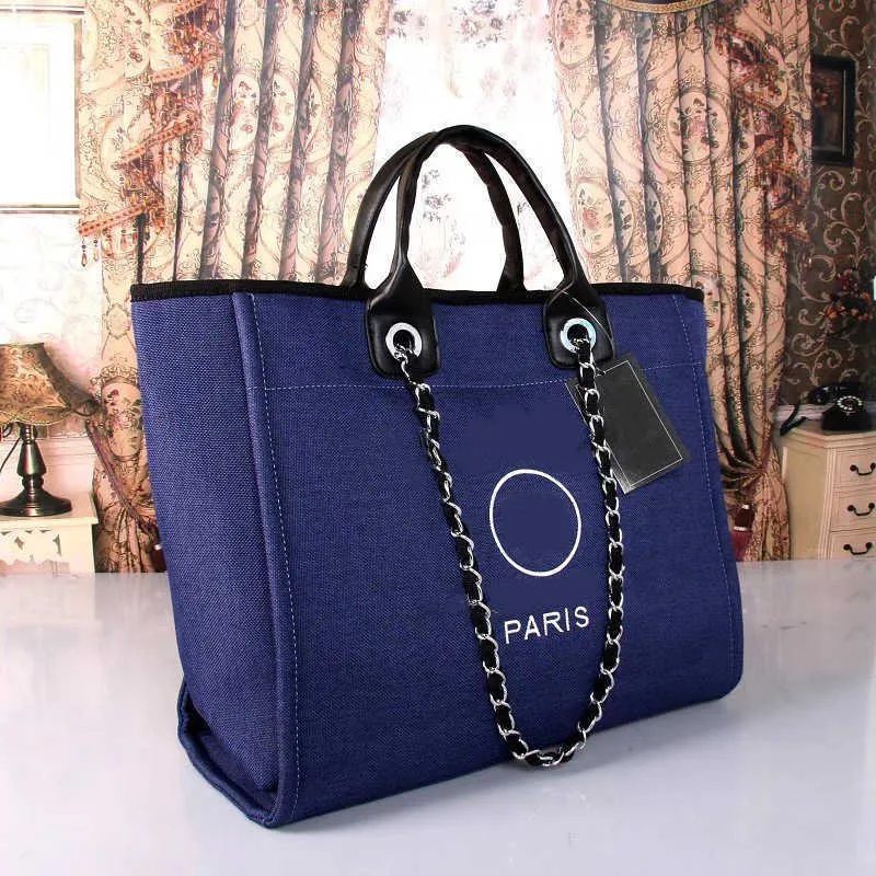 2023 Nova bolsa totes Moda feminina designer de marca de luxo Tote Bag azul Lona Casual vermelho preto Um Ombro Portátil Couro Feminino Compras Bolsa de ombro W221130