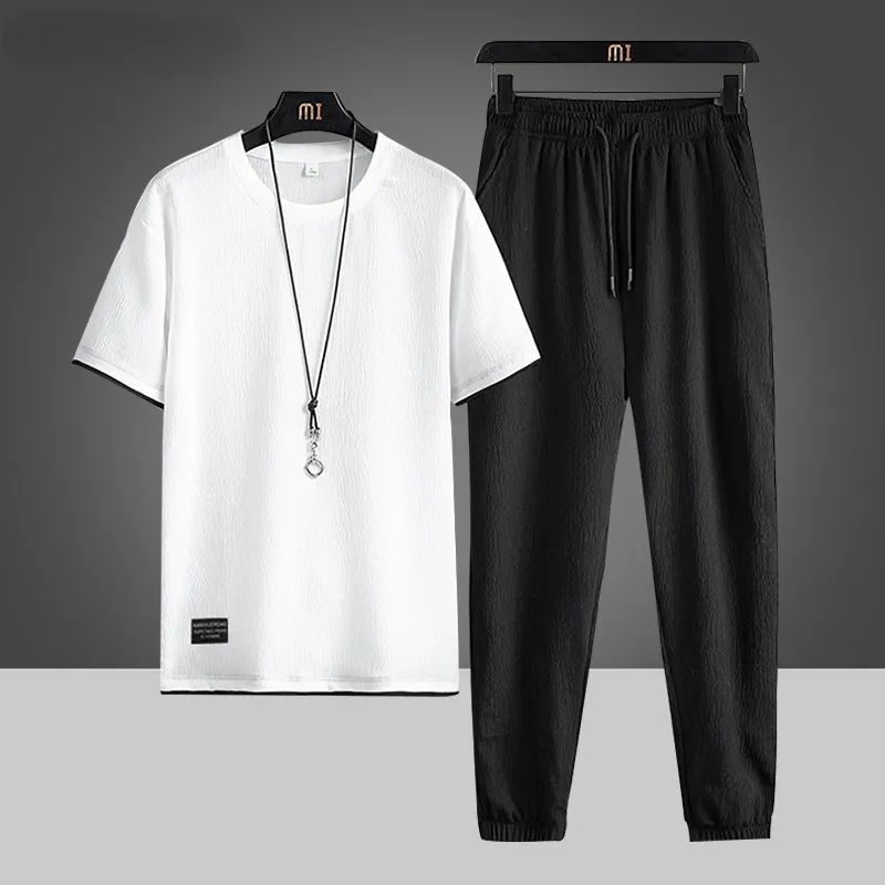 New Men Casual Sets Harajuku Tuta Ice Silk Summer Uomo Jogger Tuta Sportiva T-Shirt Pantaloncini Solido Abbigliamento Traspirante