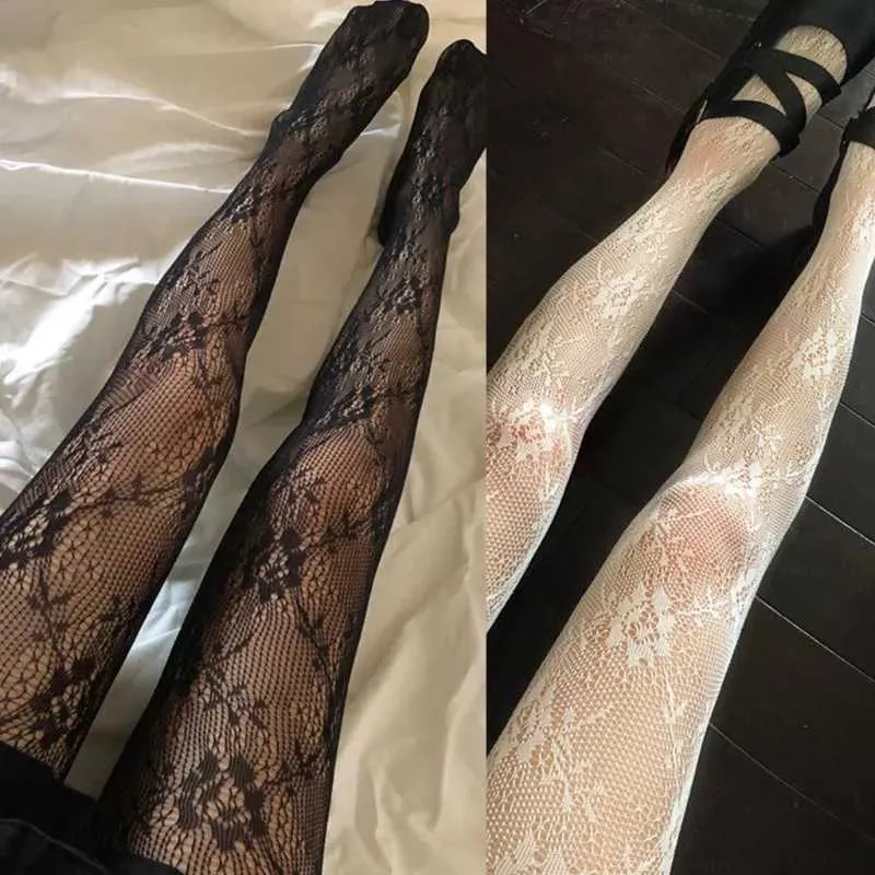 Skarpetki Zamorowe kobiety kwiatowe koronkowe rajstopy japoński w stylu przejściowym rajstopy fishnet vintage Perspective Net Stockings T220930