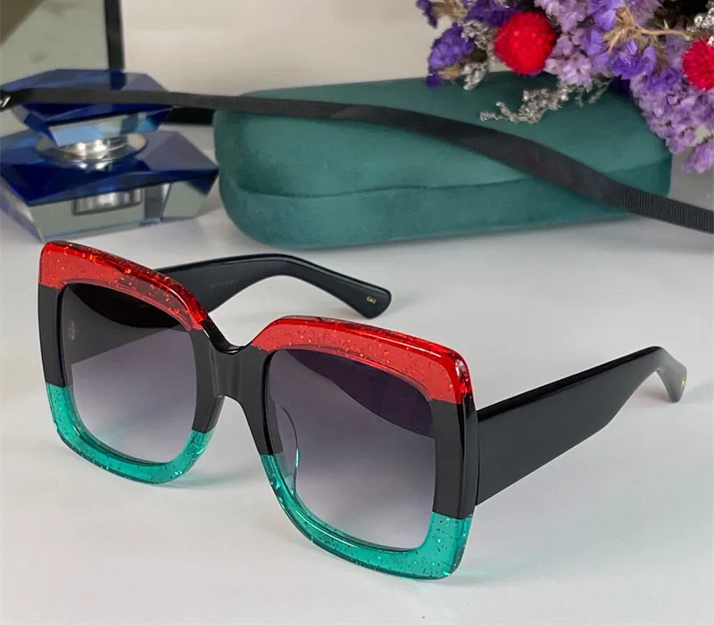 Modedesigner-Sonnenbrille 0083 für Damen, klassischer Vintage-Stil, rot-grüner Rahmen, quadratische Form, Sommerbrille, vielseitiger Stil, Anti-Ultraviolett-Schutz, mit Etui