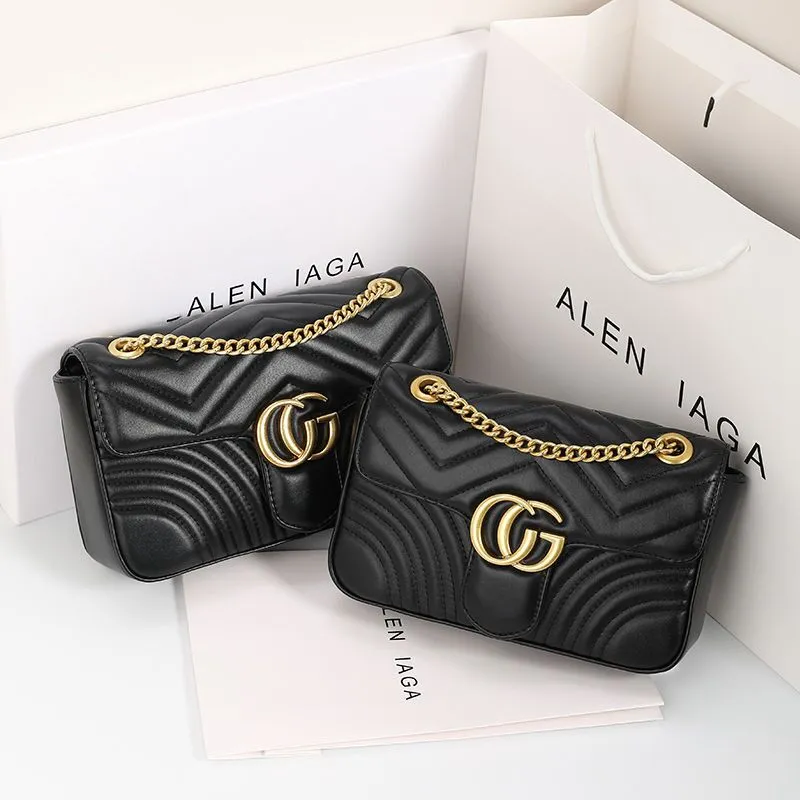 Black Leather GG Marmont Small Matelassé Shoulder Bag With Heart | GUCCI® AE