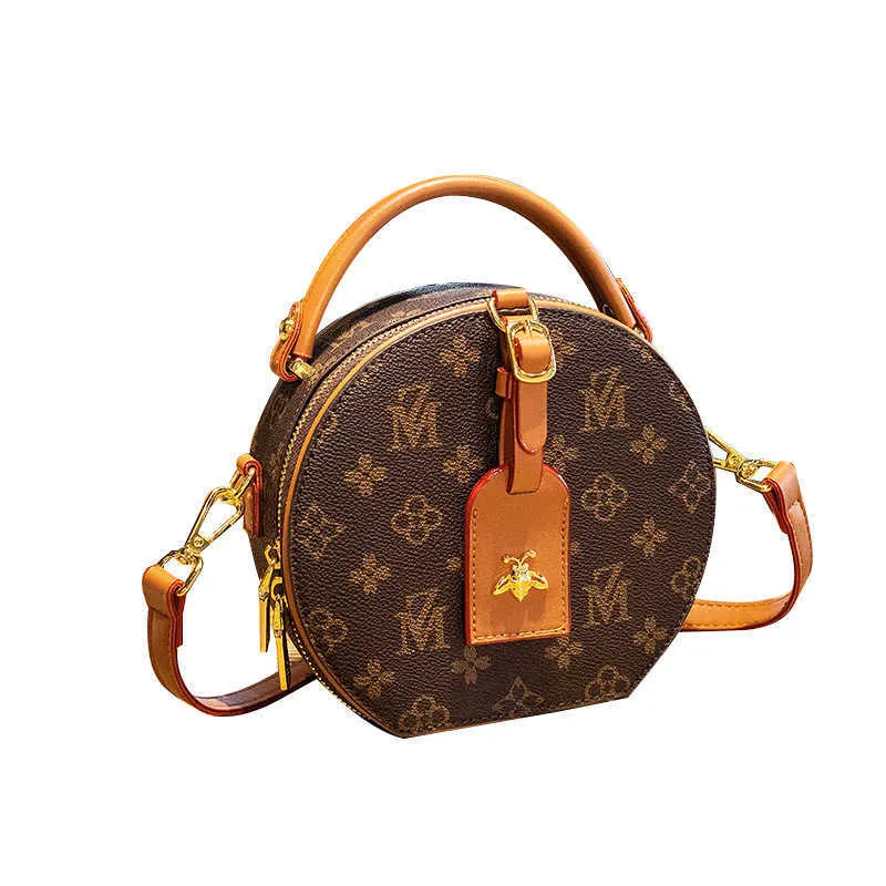 Niche Brand Luxury Design Round One Crotgle Crossbody Bag 2022 Fashion Rounded الأكياس المستديرة.