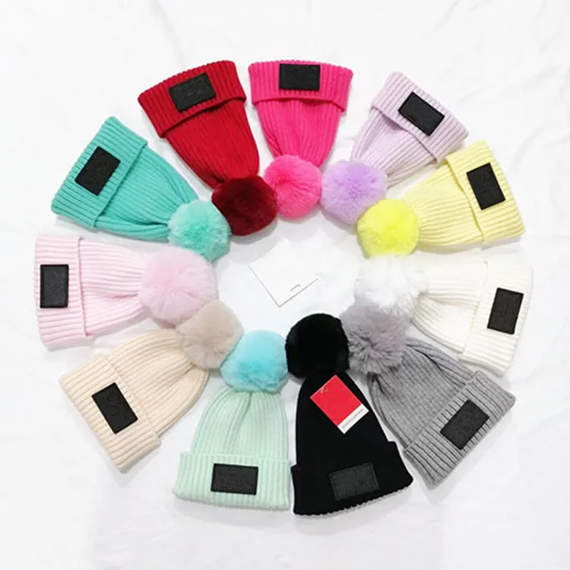 Kids Knitted Hats Fashion Letter Pompon Beanies Boys Girls Fur Pom Knitting Skull Caps Children Bonnet Winter Warm Beanie Designer Ear Muff 11Colors