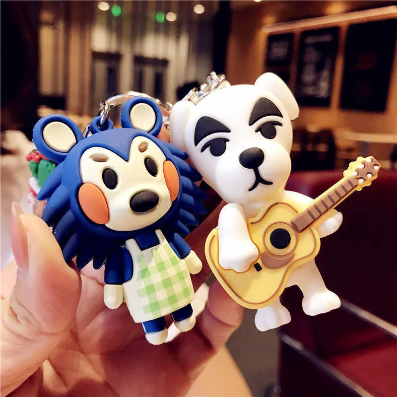 Nyckelringar Animal Crossing KeyChain Doll Car Key Chain Isabelle KK Nook Figures Toy Pendant Small Cute Keyring Accessories for Gift R231204