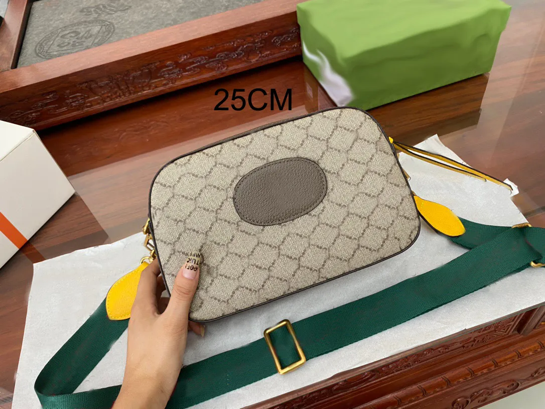 gerçek deri lüks tasarımcılar çanta kadın erkek kamera çantaları klasik markalar omuz kılıfları kaliteli üst çantalar tuval bayan moda çanta crossbody