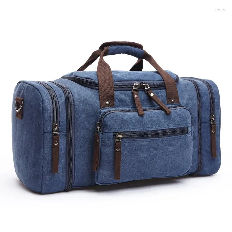 Duffel Bags 2022 Unisex herenreistas draagbare canvas messenger grote duffel trend grote capaciteit casual schoudermode