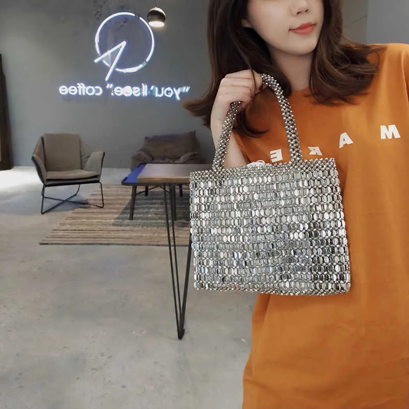 Shoulder Bags Handwoven Beaded Women's Fashion Retro Metal Shiny Female Handbag Designer Sequin Pearl Drawstring Shopping 230725