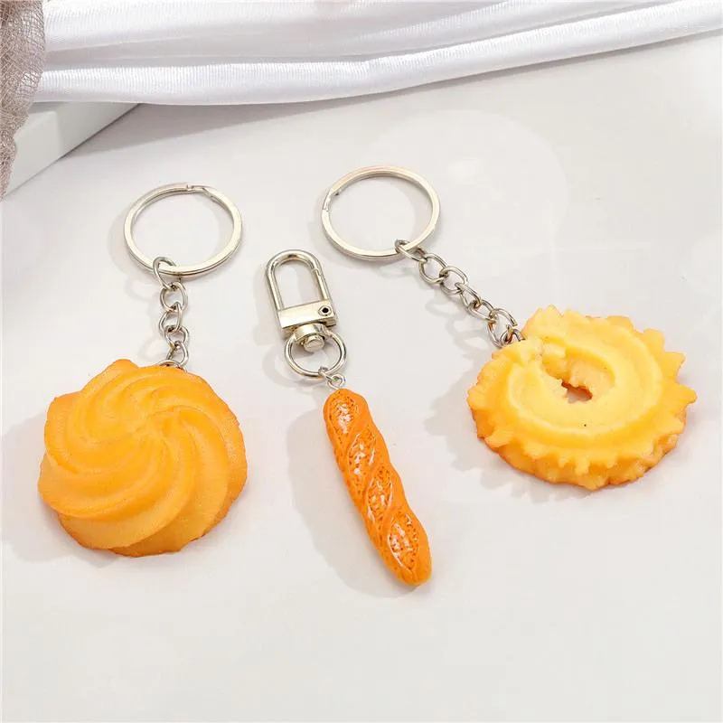 Keychains 1pcs Cookies Pão com alimentos pendentes de cadeias -chave para presente de amigo de simulação criativa exclusiva biscoit bisagette bag de caixa de carro anel