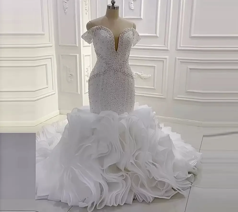 Luxe zeemeermin trouwjurken 2022 Ruffles trein kralen pailletten plus size bruidsjurken van de schoudervestido de noiva African