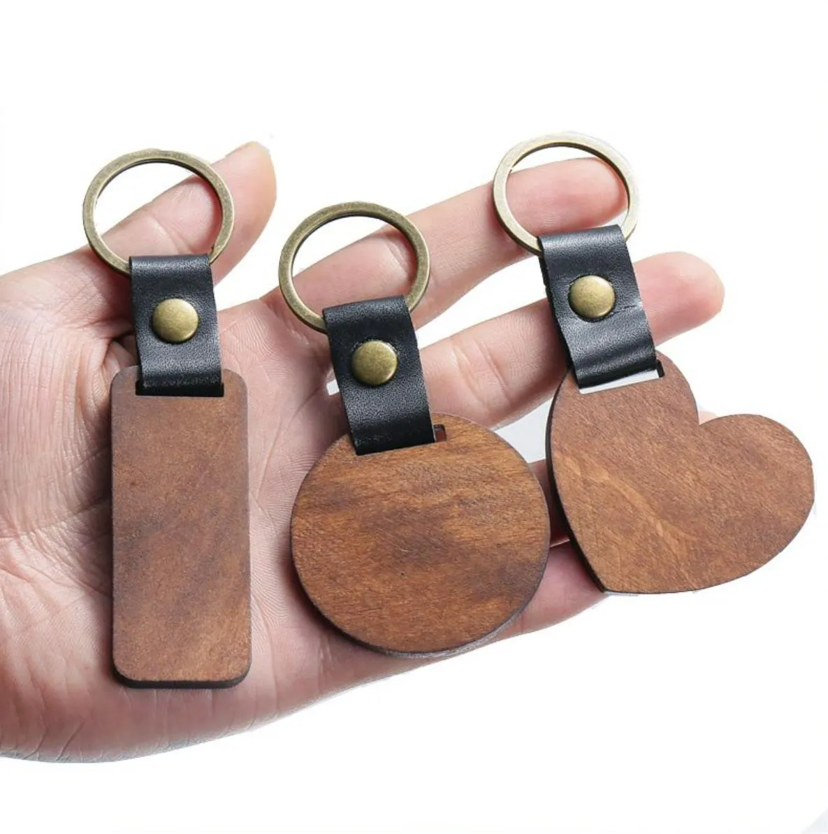 Porte-clés en bois bricolage pendentif faveur de fête porte-clés en cuir en forme de coeur porte-clés en Bronze cadeaux de noël porte-clés en gros