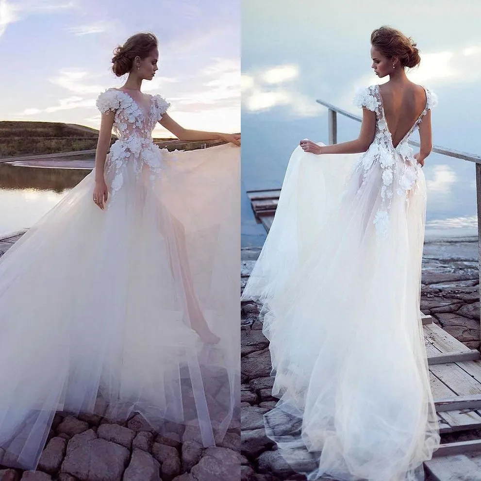 Abiti da sposa sexy A Line Abito da sposa trasparente manica corta Backless Fiori 3D Appliques Tulle Lunghezza pavimento Robe De Soiree