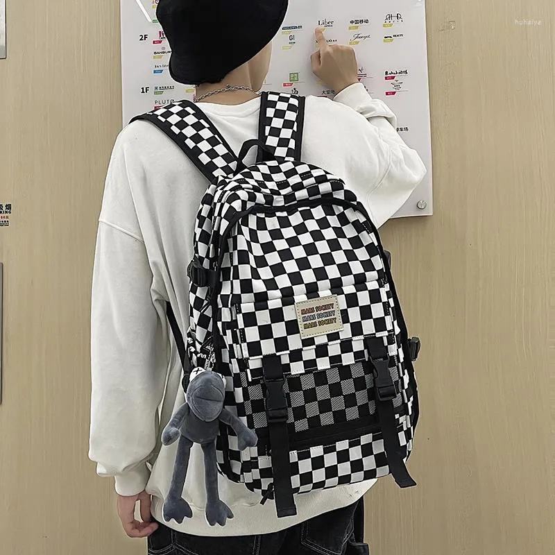Ryggsäck checkerboard kvinnlig nisch design skolväska par college studenter ins modemärke dator 15 tum