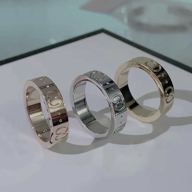 Bant Rings Luxurys Designers Bant Yüzük Moda Erkek Kadın Titanyum Çelik Oyma Mektup Desen Sevenler Mücevher Dar Yüzük Boyutu 5270g