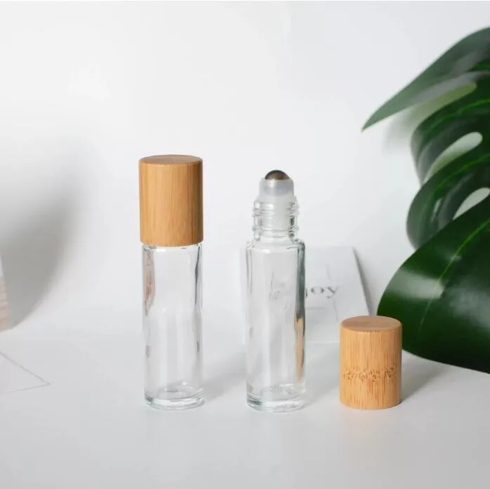 Bouteilles à rouleaux en verre transparent de 10 ml avec couvercles en bois de bambou naturel Rouleau d'huile essentielle cosmétique sur emballage de tubes