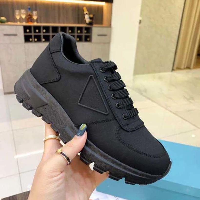 Casual Shoes high quality Women Sneakers Designer Shoes Lnspired by motorcycle wheels a nylon gabardine sneaker has Thick rubber sole Ariangular