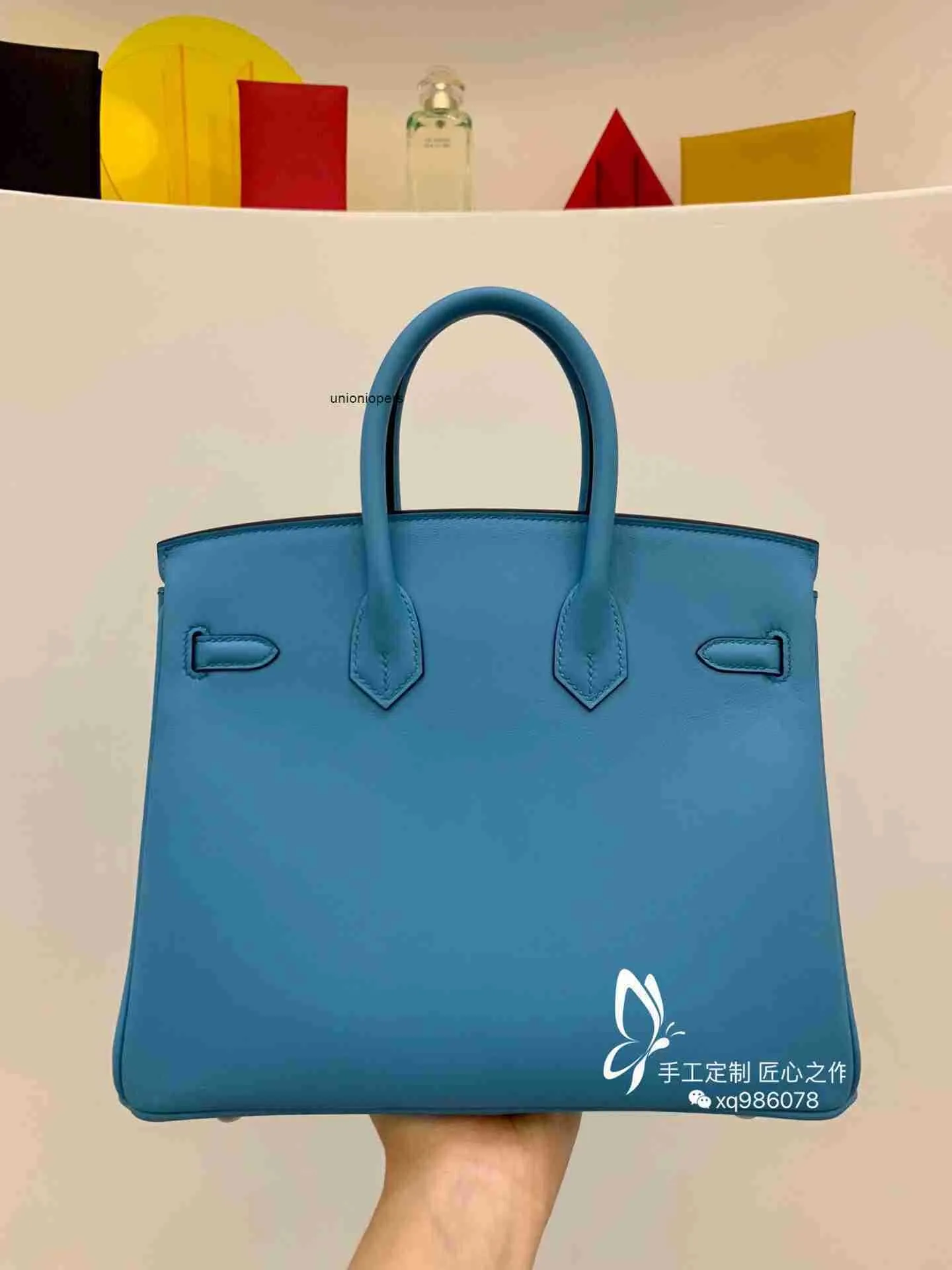 Kellyity Bag Designers sacs à main Birkinbag Femmes Sacs Tous le fil de cire manuel Couture BK25cm Swift Saddle Cuir Northern Blue Silver Button portable Femme grande AYW