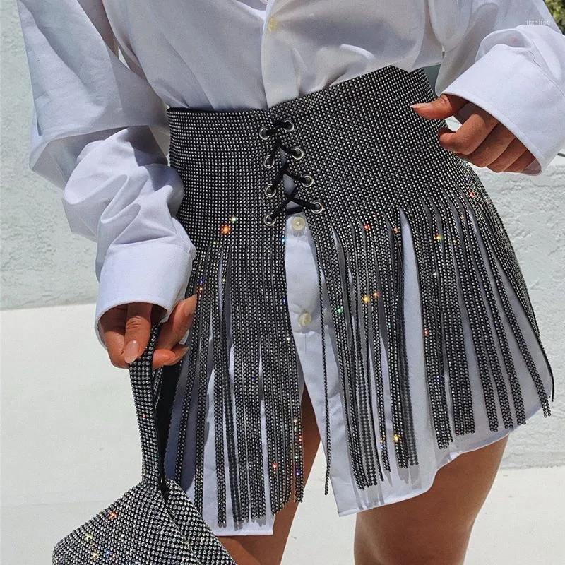 Kjolar 2022 Spring Pencil kjol Kvinnor Kläder Glittering Crystal Pendant Hollow Out Chain Patchwork Party Tassel Mini