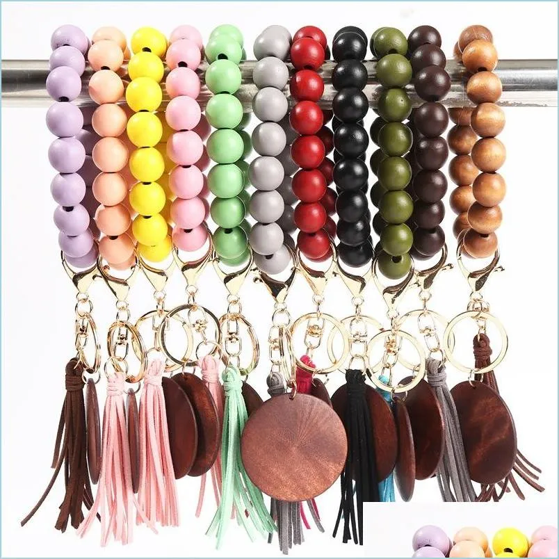 Keychains Lanyards Crossborder kralen houten kraal sleutelhanger mode gepersonaliseerde schijf kwastelarmband sleutelring vrouwelijke mticolor opti dhsq6