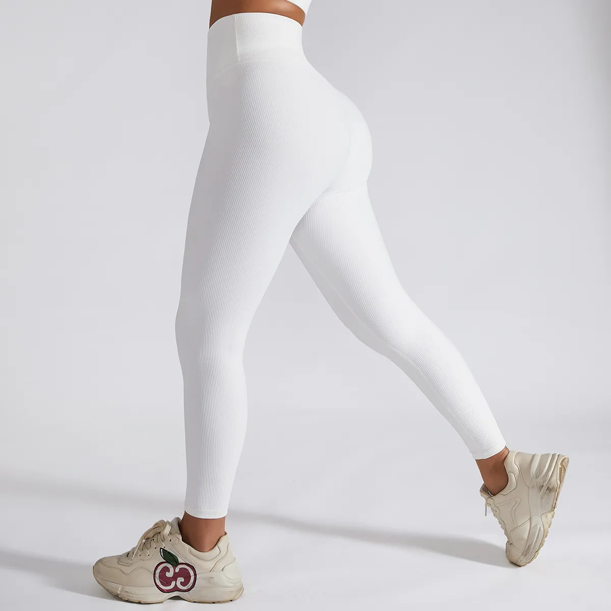 Abiti da yoga Nuovi esercizi da corsa Fitness Sollevamento glutei Pantaloni elasticizzati per stomaco a vita alta da donna