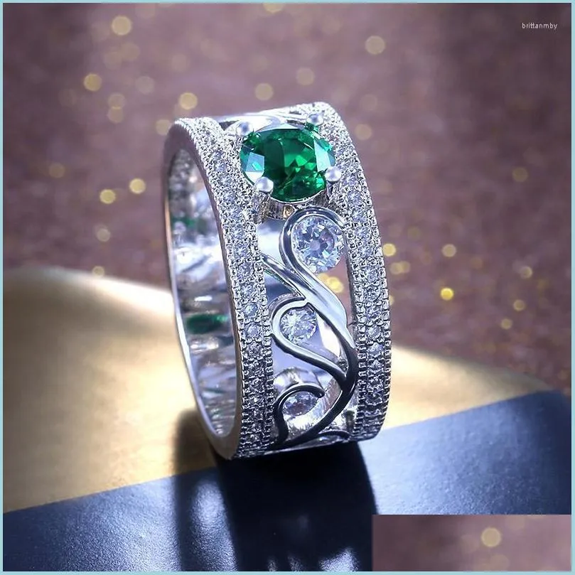 Anneaux de mariage Anneaux de mariage évider fleur pierre verte pour femmes zircon cubique large doigt bague de fiançailles femme Vintage bijoux Dhgb1