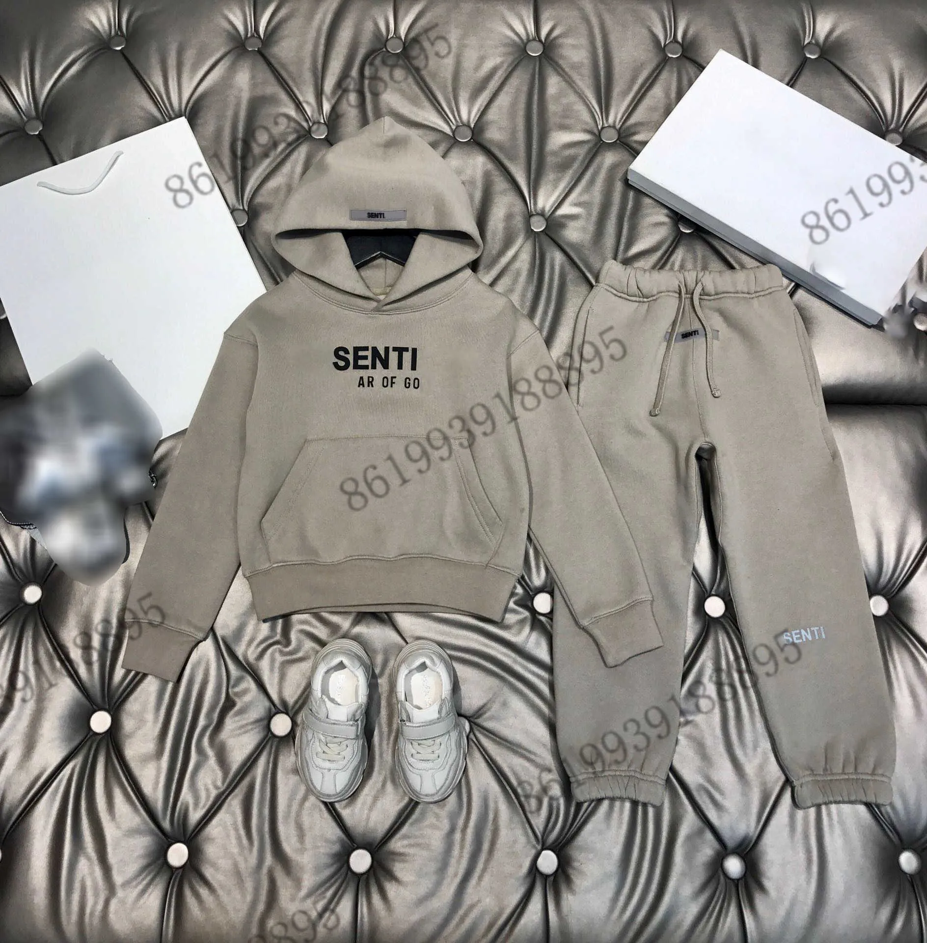 Set di abbigliamento 2022SS Springs Designer Set grigio set grigio pantaloni con cappuccio per maglione con cappuccio cotone per bambini abiti da marca gigantesche per maglione di abbigliamento Sagni di maglione 110-160 ragazzi