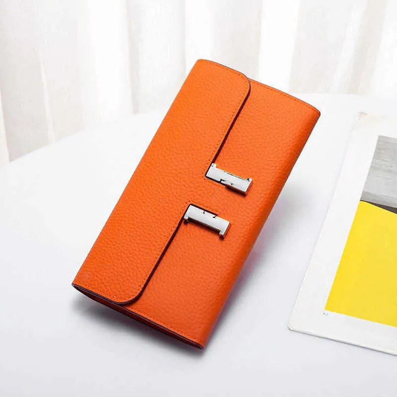Lyxdesigner handväska 2024 Nya modekopplingar äkta läder dam ljus lyx plånbok enkel student stor varumärke lång högklassig kortväska fabrik direktförsäljning