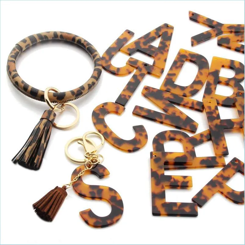 Keychains Lanyards Leopard Acetate 초기 키 체인 골드 컬러 가죽 키어링 브레이싱 브레이슬릿 클래식 펜던트 알파벳 수지 키 절인 GI DH1D4