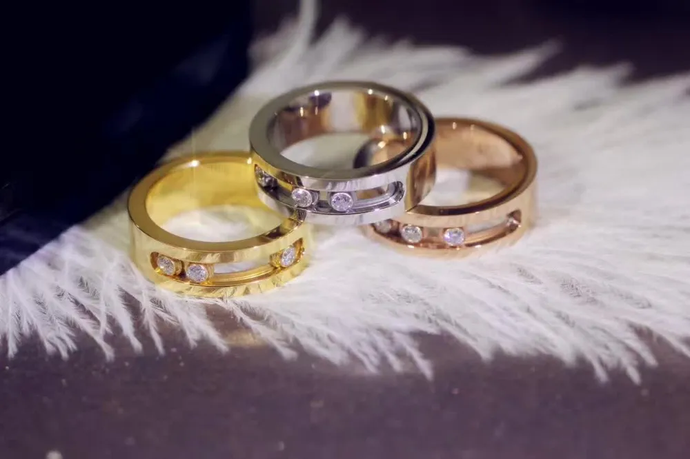 L'impostazione di tre anelli di amore in acciaio inossidabile con zirconi di movimento Bijoux Women Lady Gift fashion france jewelry moving rings