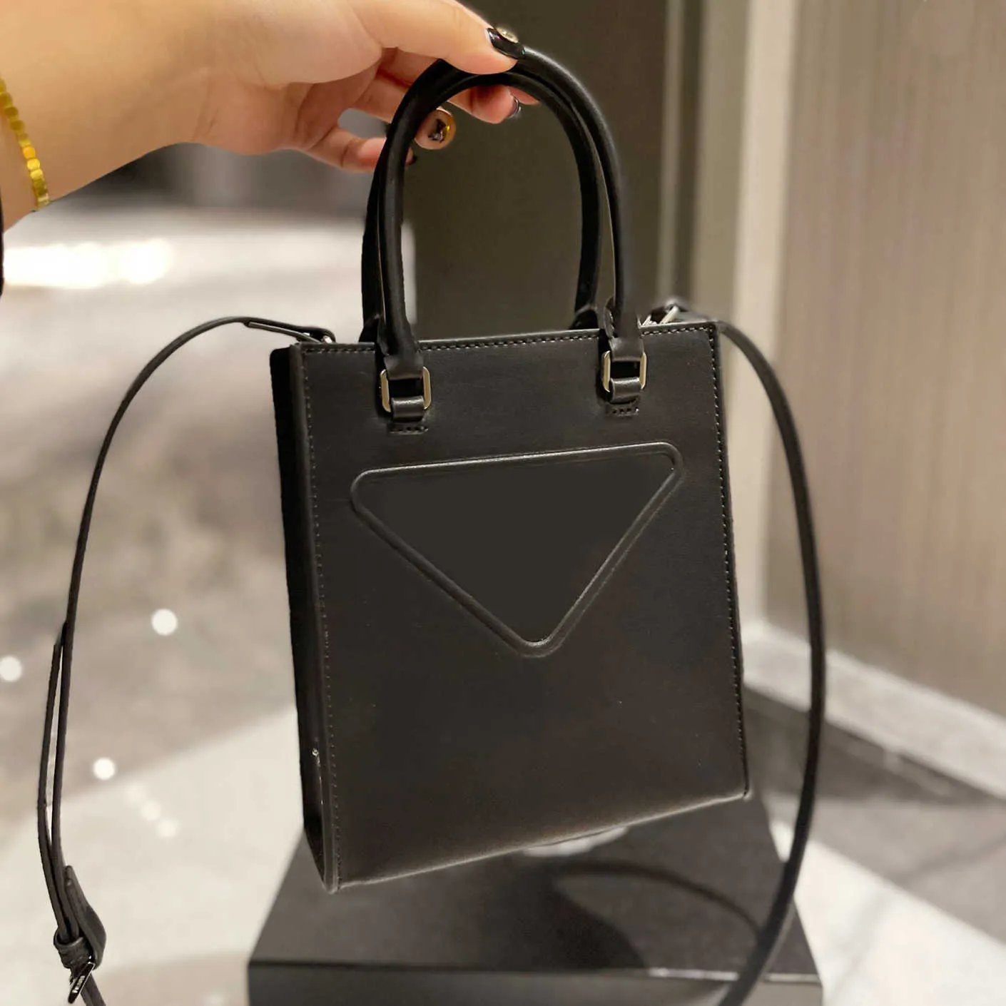 Bortkolor Luxurys designers väskor axelhandväskor p mode kvinnors kvalitet hög plånbok korskropp mini noter slappa totes 2022 crossbody handväska