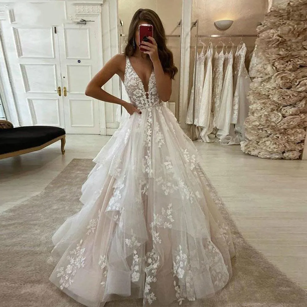 بلا أكمام Tulle v-neck Sweep Train Train-Linment-Liner A-Lineless بلا أكمام فستان زفاف Boho Lace 2021 بالإضافة إلى العروس الحجم