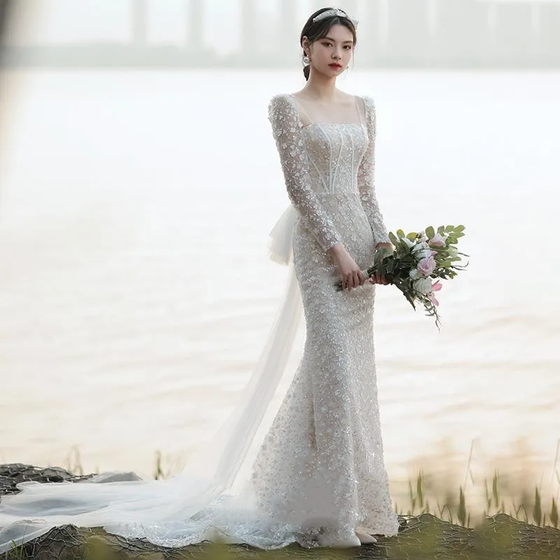 Eleganta långa ärmar sjöjungfru bohemisk bröllopsklänning paljett vit spets applicerad plus size country strand boho brudklänning
