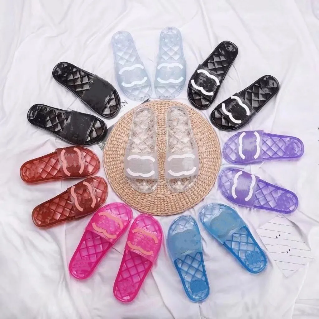 Tofflor transparent söt sandaler designer 2022 godisfärgade lägenheter gummistellskor flip-flops utomhus strandskor stövlar