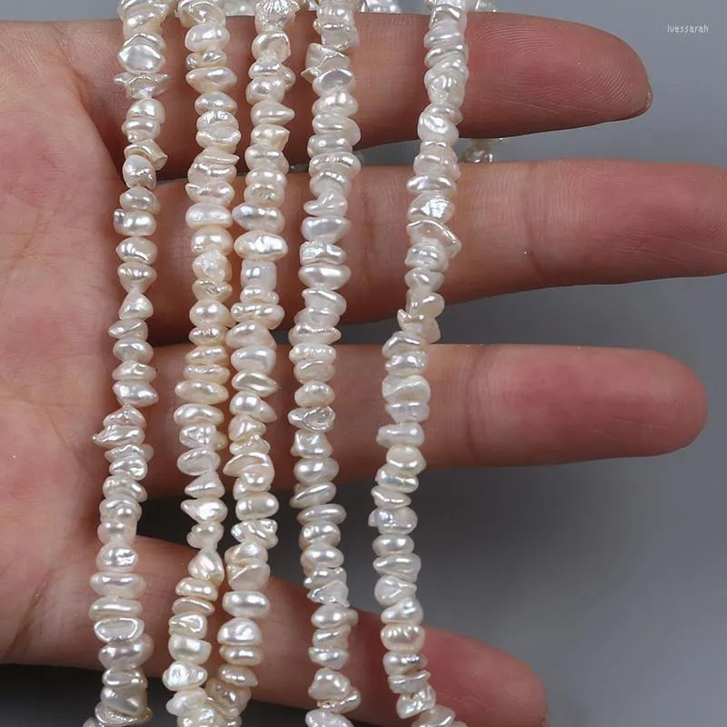 Łańcuchy naturalne wyciągnięte środkiem 4-5 mm luźne białe pasma Keshi Pearl