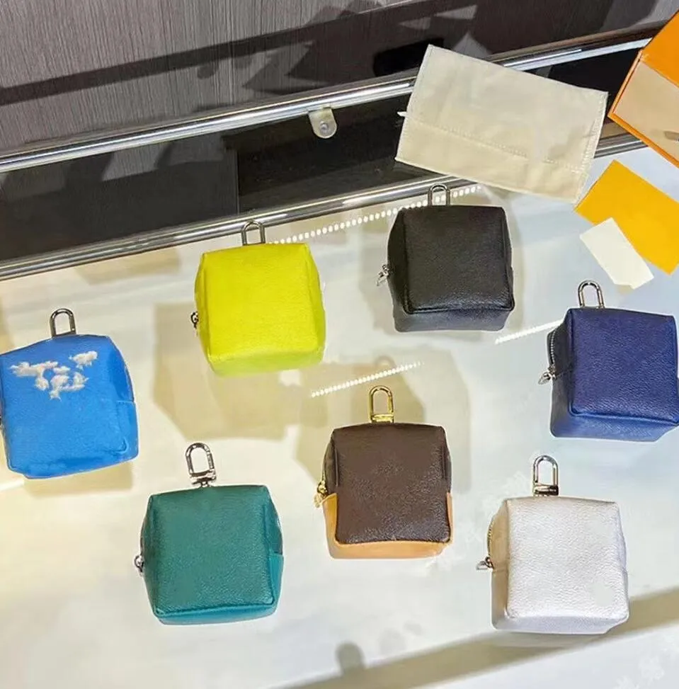 Mini Impresión de cuero Monedero Auriculares Embalaje Moda Multi-Estilo Llaveros Mujeres Cambiar Monedero Llaves Cadena Bolsas Mochila Estuche para llaves Accesorios colgantes