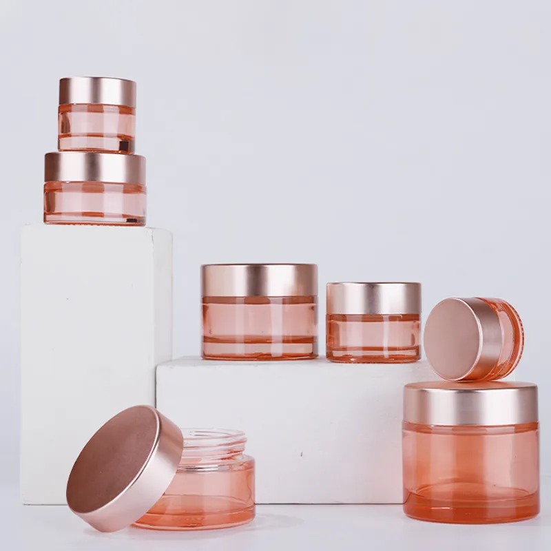 Rosafarbene Glascreme-Kosmetikflaschen, runde Hand- und Gesichtsverpackungsflasche, 5–100 g, mit roségoldenem Verschluss