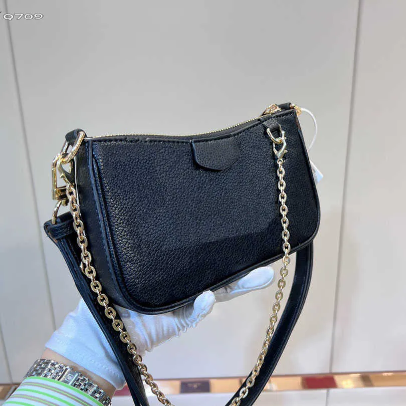 Kosmetiska väskor Fodral Easy Pouch On Strap miniväska för kvinnor Läder luffare Mobiltelefon Plånböcker Cross Body plånbok Designer handväskor damväska lyxväskor