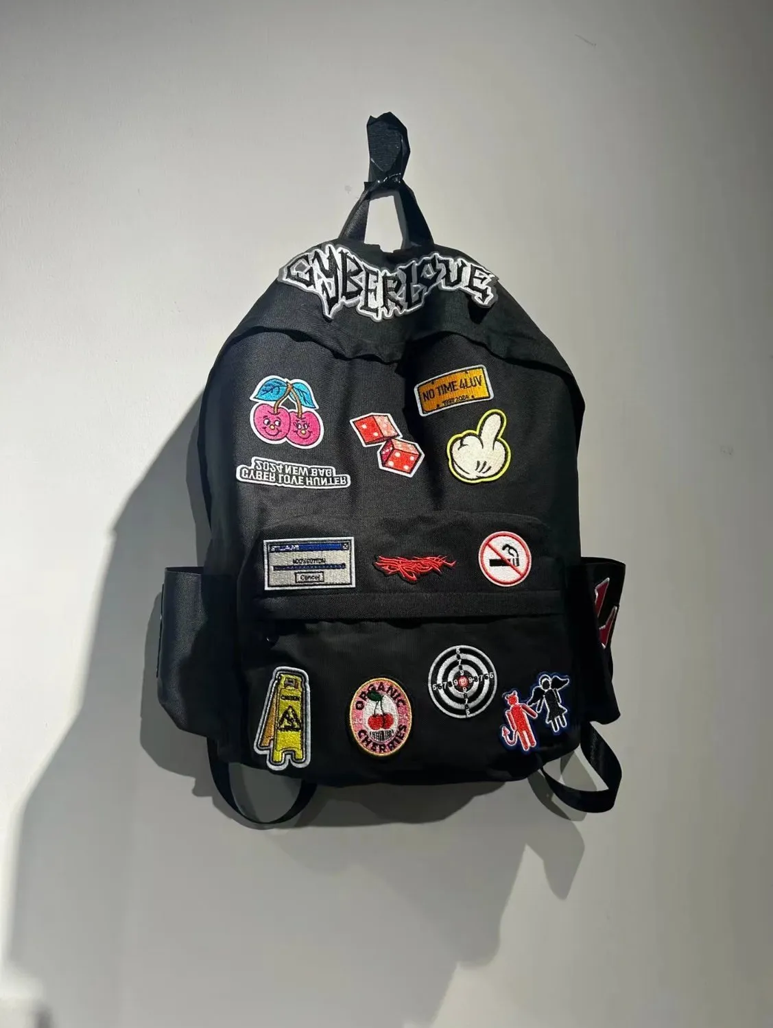 Y2K streetwear backpack 14-inch laptop capacity black patchwork