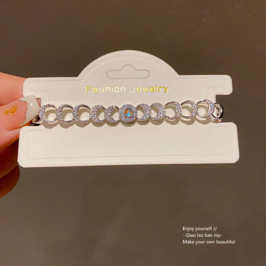 Silver-Tone Bracelet With Circular Crystal Accents, Fashion Chic Style, Featuring Intricate Ring Design And Sparkling_voghion.com
